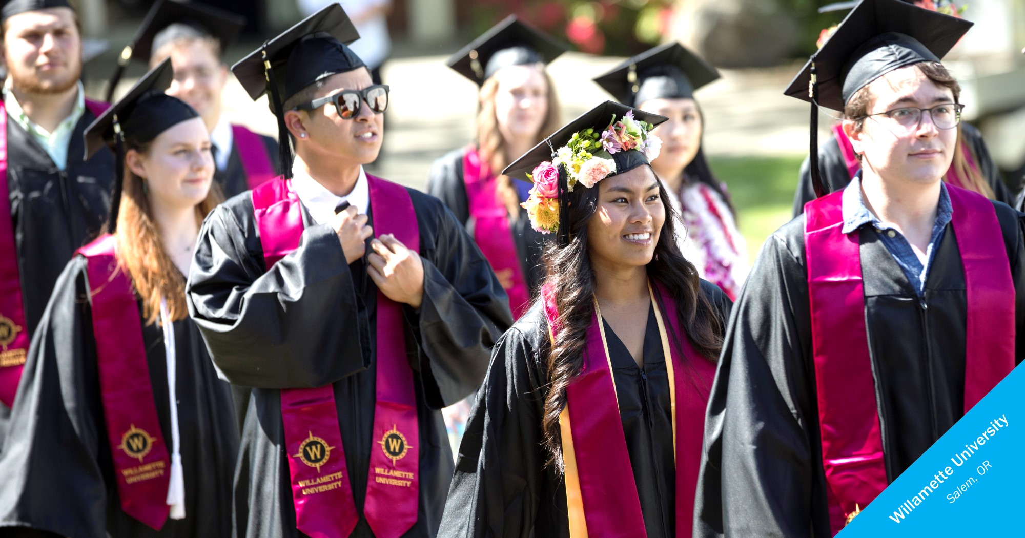 Smiling graduates of Willamette University