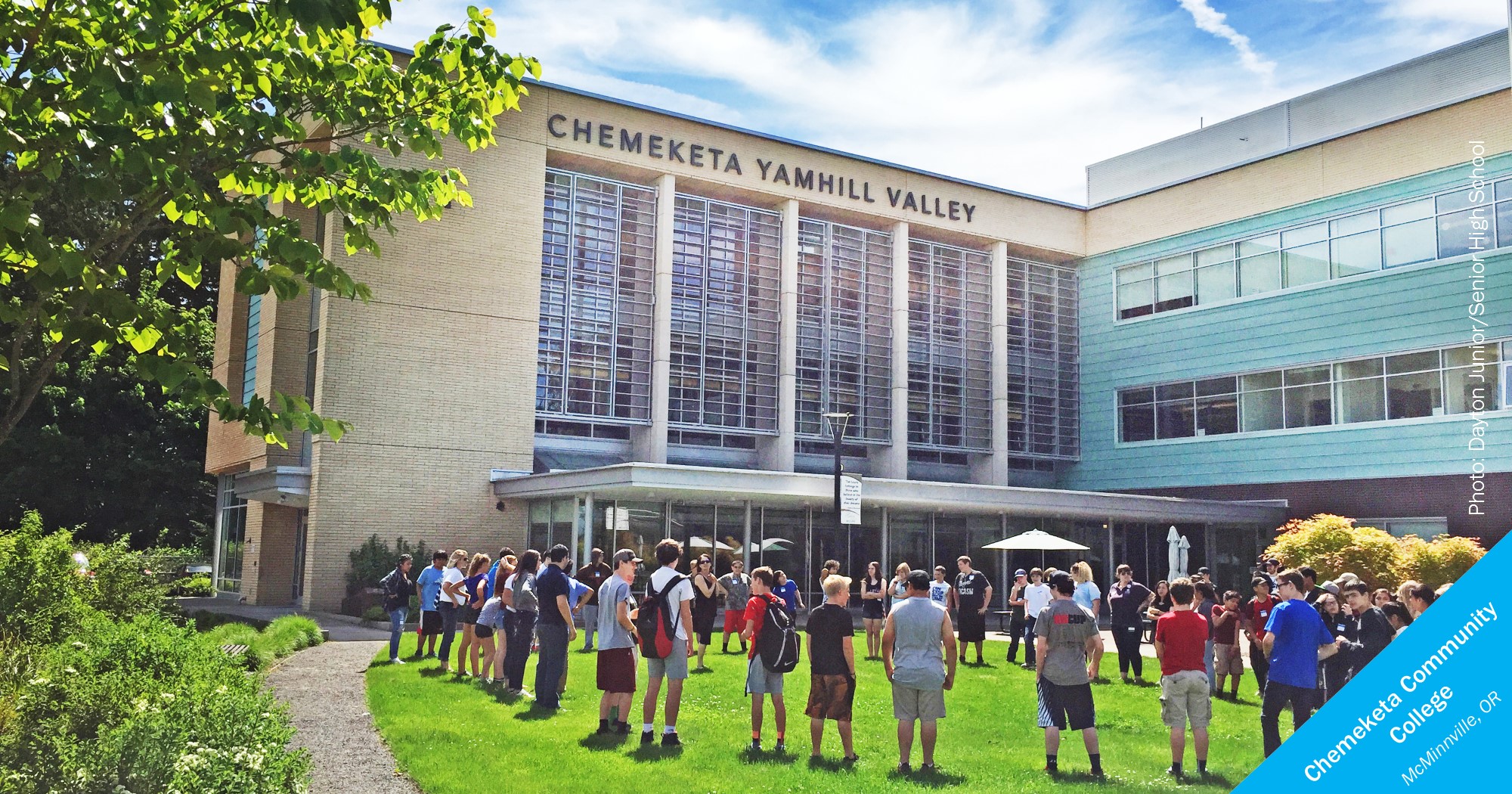 Students standing in a circle in front of Chemeketa Yamhill Valley building