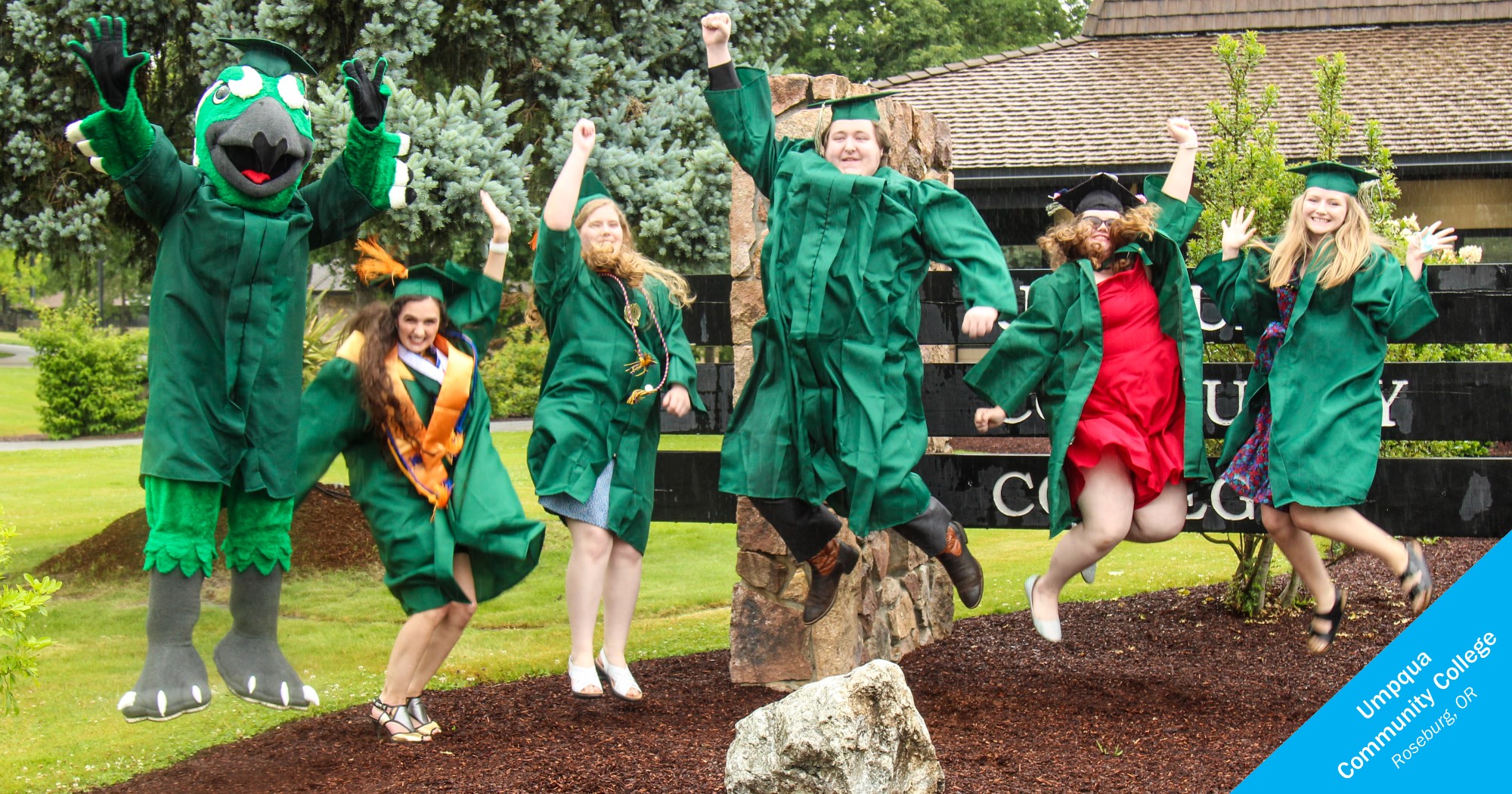 Umpqua Community College graduates jumping
