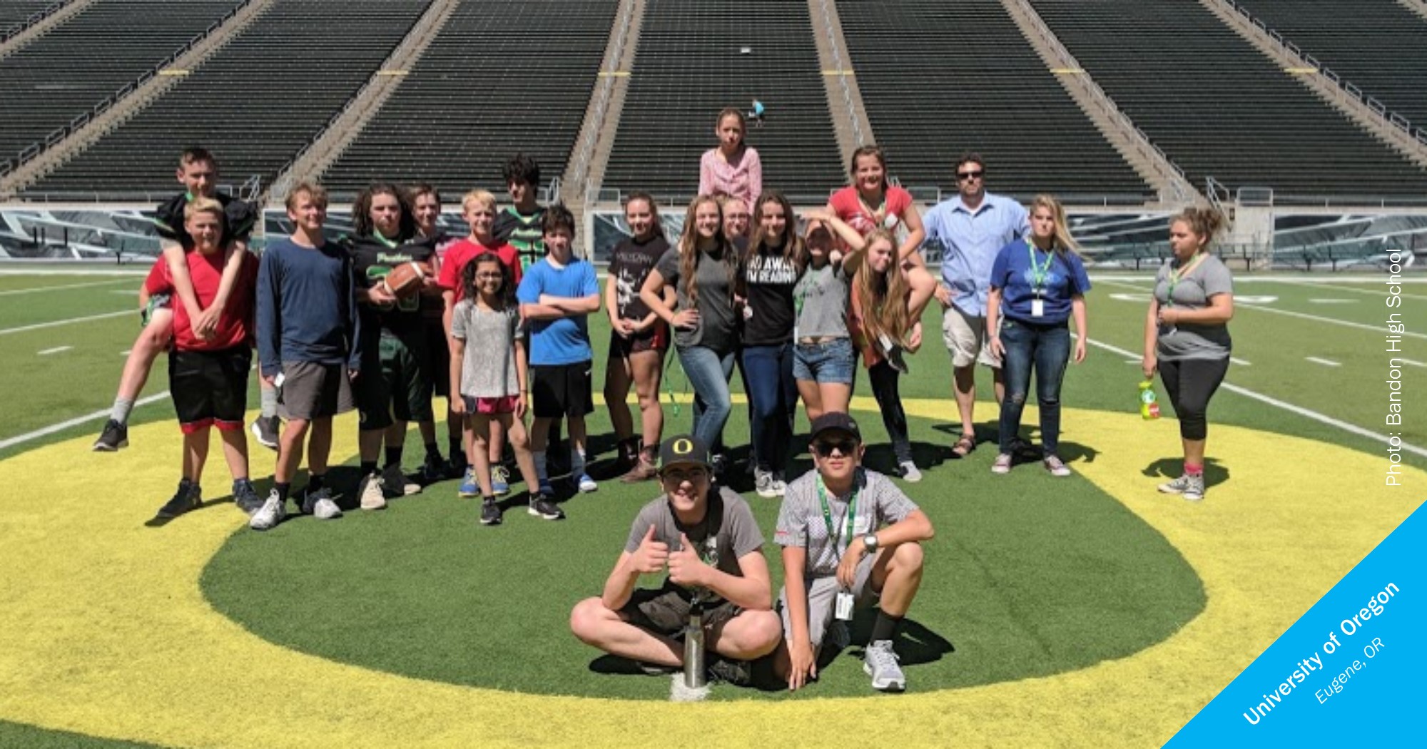 Smiling students from Bandon on the UO football field